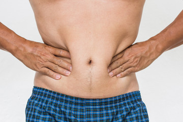 Man showing his fat on the stomach