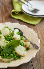 Potato salad with mint and peas