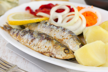 fried sardines with boiled potato