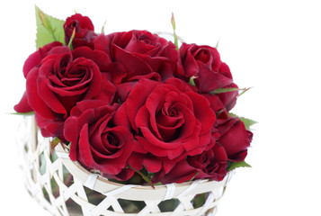 Beautiful roses in basket isolated