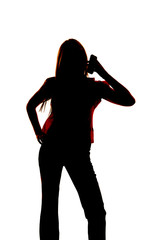 silhouette of woman on a cell phone