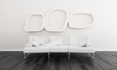 White couch in front of artwork