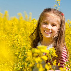 cute little girl in a field