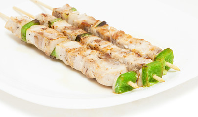 chicken skewers on white background