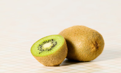 Green cutout fruit kiwi on the table
