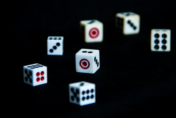 7 dices on black background