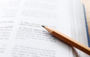 Obraz premium Pencil and book