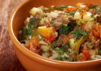 boiled pearl barley with meat and vegetable