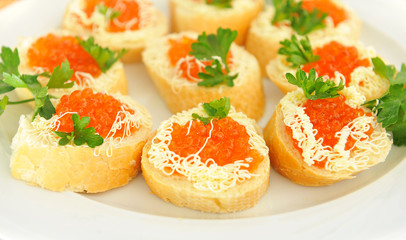 Sandwiches with red caviar, delicious looking for  holiday.