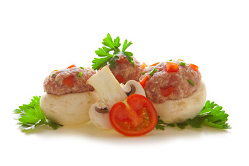 Mushrooms stuffed with ground meat.