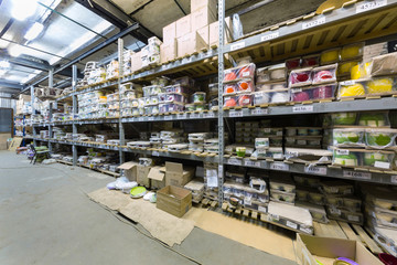 Warehouse on Baikal street with shelves full of flowerpot