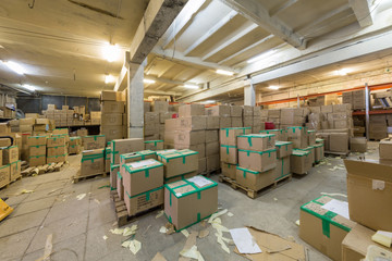 Large warehouse with cardboard boxes