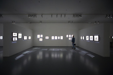 Man on photo exhibition