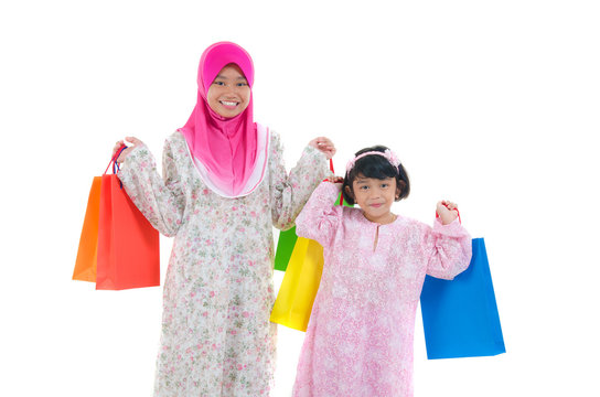 Malay Sisters During Raya Shopping Festival