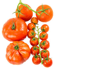 A group of various type and sizes of tomatoes