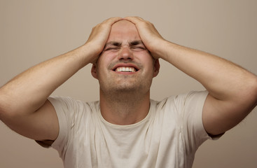 Shocked young man isolated