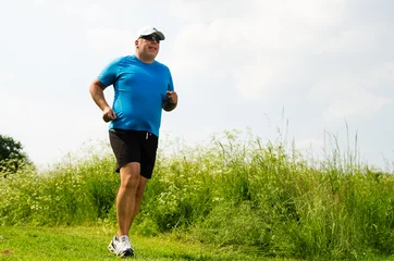 Selbstklebende Fototapete Joggen fettverbrennung durch joggen