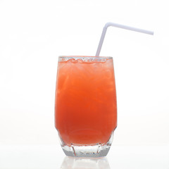 Carrot cold herbal drink in glass isolated