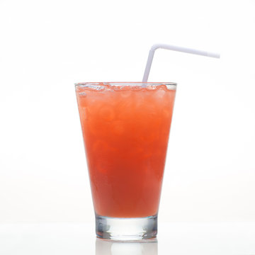 Carrot cold herbal drink in glass isolated