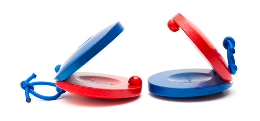 pair of red and blue castanets - obrazy, fototapety, plakaty