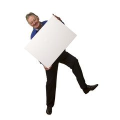 Casual senior businessman holding blank sign.