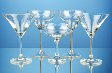 Cocktail glass set on blue background