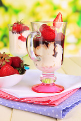Delicious strawberry desserts in glass vase