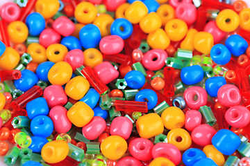 Fototapeta na wymiar Different colorful beads close-up