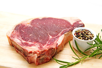 Raw dry aged t-bone steak