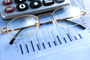 fondo de finanzas y economia.Estadisticas,graficos y gafas
