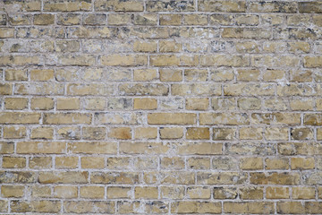 Worn Weathered Dirty Yellow Brick Wall Background