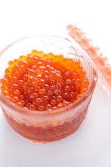  japanese cuisine, seasoned salmon roe Ikura in glass container