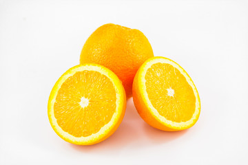 ripe round oranges on white backgroud