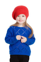 little girl in a red cap smiles, isolation on white