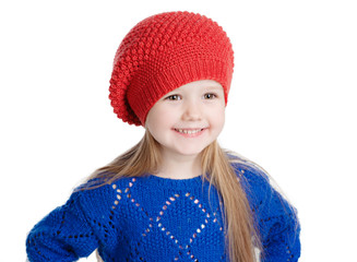 little girl in a red cap smiles, isolation on white