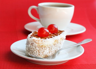 Cakes with biscuit, butter cream and coconut