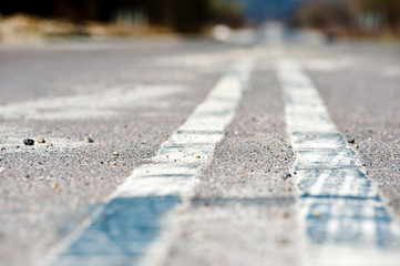 Double lines on asphalt