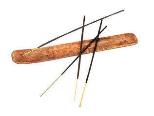 Incense stick in wooden holder