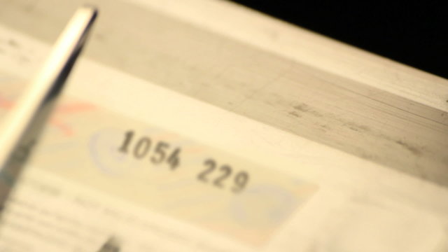 Cutting a credit card. Find similar clips in our portfolio.