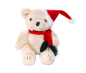 Teddybär als Weihnachtsmann isoliert