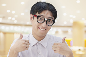 Nerdy Man Giving Thumbs Up