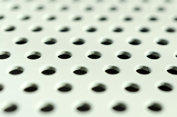 white seamless circle perforated metal grill pattern.