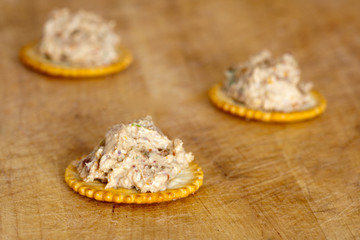 crackers with artichoke spread