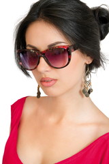 Fototapeta premium a portrait of a young brunette girl in glasses