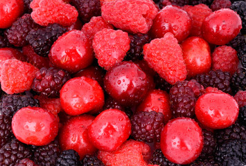 cherry, raspberry, blackberry on full background