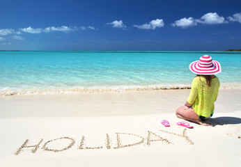 Girl relaxing on the beach of Exuma, Bahamas