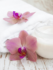 moisturizing cream with pink orchids
