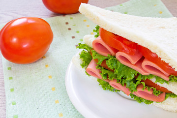 sandwich with ham and vegetables