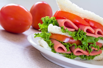 sandwich with ham and vegetables