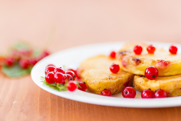 Pancakes with red currants
